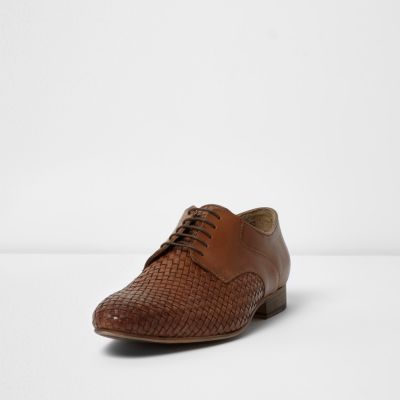 Tan woven lace-up shoes